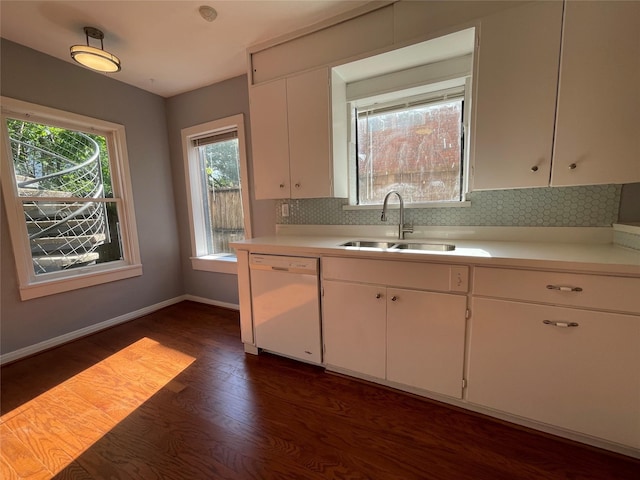 1805 Sul Ross St, Houston, TX 77098 - kitchen featuring dishwasher, dark wood-style floors, light countertops, white cabinetry, and backsplash