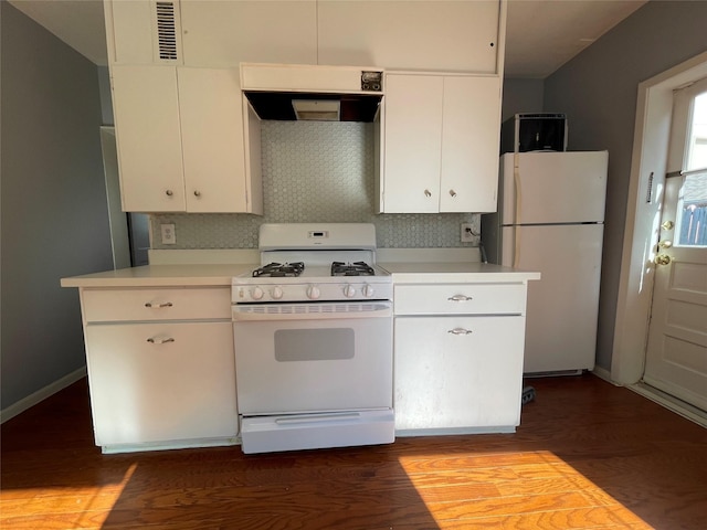 1805 Sul Ross St, Houston, TX 77098 - kitchen with white appliances, light countertops, white cabinetry, dark wood-style floors, and under cabinet range hood