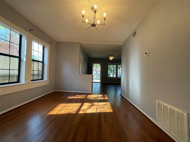 1805 Sul Ross St, Houston, TX 77098 - unfurnished dining area featuring plenty of natural light, wood finished floors, and a chandelier