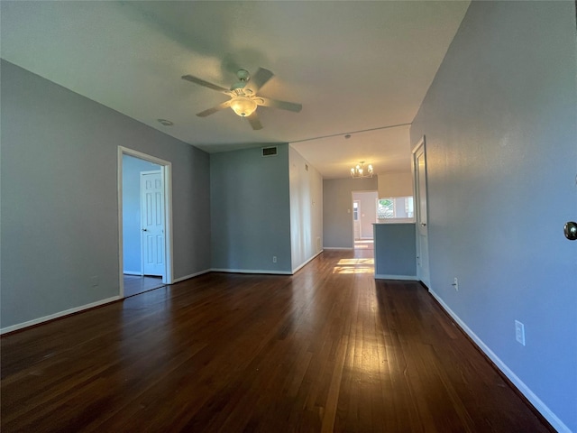 1805 Sul Ross St, Houston, TX 77098 - unfurnished living room with ceiling fan, dark wood-style floors, and a chandelier