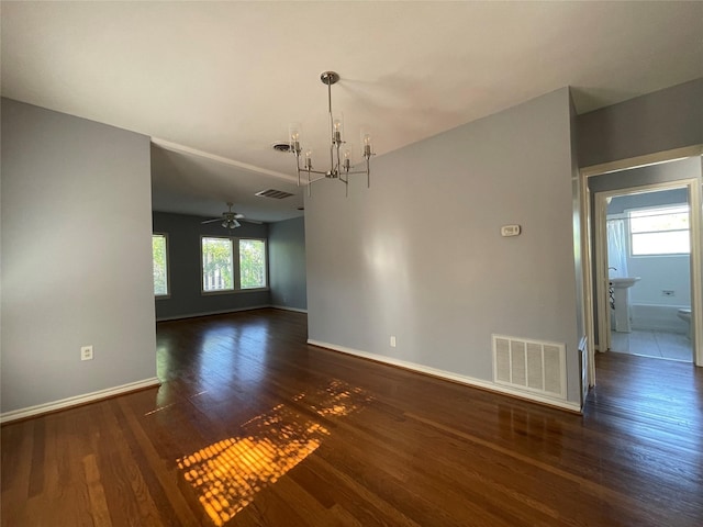 1805 Sul Ross St, Houston, TX 77098 - unfurnished room featuring a chandelier, ceiling fan, and wood finished floors