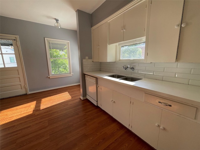 1805 Sul Ross St, Houston, TX 77098 - kitchen with dishwasher, light countertops, tasteful backsplash, dark wood-style flooring, and white cabinetry