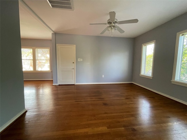1805 Sul Ross St, Houston, TX 77098 - empty room with plenty of natural light, dark wood finished floors, and a ceiling fan