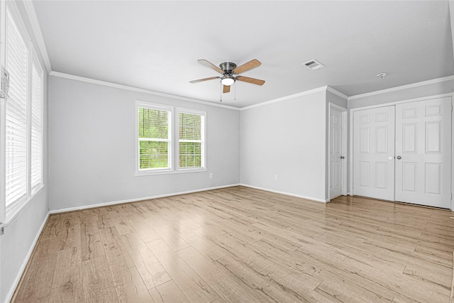 16839 Yates St, Splendora, TX 77372 - unfurnished bedroom with light wood-style flooring, crown molding, and a ceiling fan