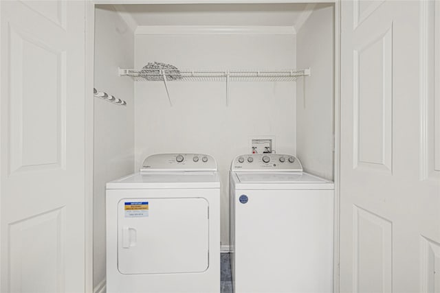 16839 Yates St, Splendora, TX 77372 - laundry room featuring crown molding and separate washer and dryer