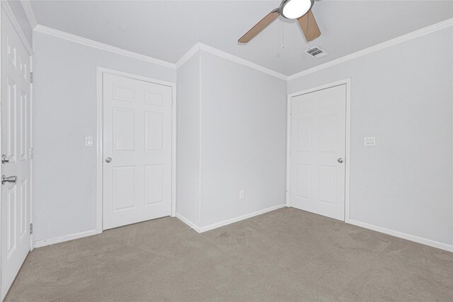 16839 Yates St, Splendora, TX 77372 - unfurnished bedroom featuring carpet flooring, ornamental molding, and ceiling fan