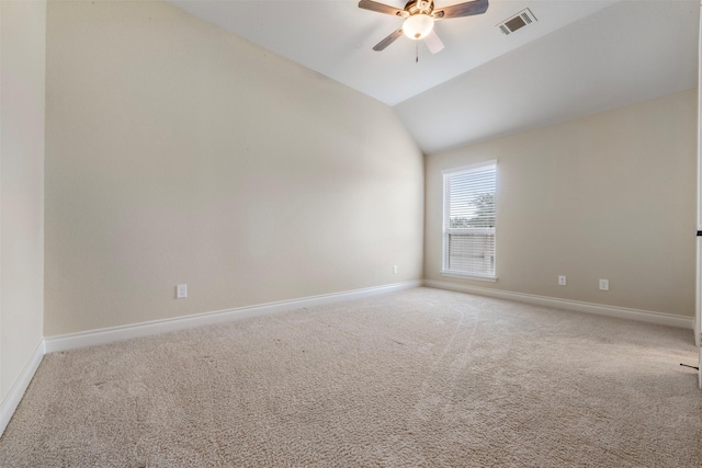 1504 Moreland Park Ct, Friendswood, TX 77546 - empty room featuring light carpet, a ceiling fan, and vaulted ceiling