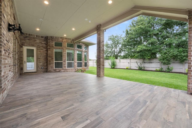 1504 Moreland Park Ct, Friendswood, TX 77546 - wooden terrace featuring a fenced backyard and a patio