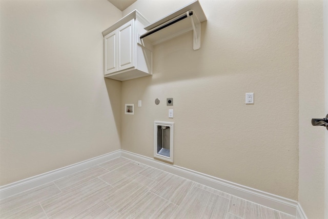 1504 Moreland Park Ct, Friendswood, TX 77546 - washroom featuring washer hookup, electric dryer hookup, cabinet space, and hookup for a gas dryer