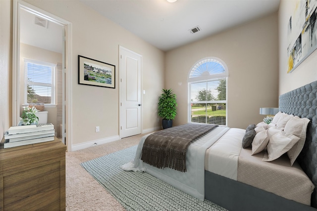 1504 Moreland Park Ct, Friendswood, TX 77546 - carpeted bedroom featuring multiple windows