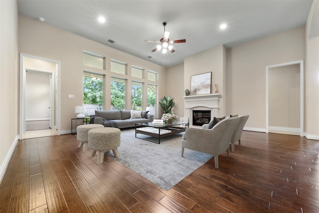 1504 Moreland Park Ct, Friendswood, TX 77546 - living room with a ceiling fan, a glass covered fireplace, dark wood-type flooring, and recessed lighting
