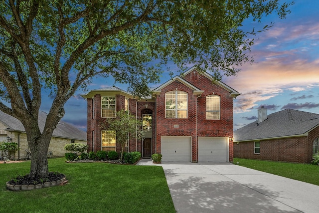 2508 Sun Glen Dr, Pearland, TX 77584 - traditional-style home with concrete driveway, a garage, a yard, and brick siding