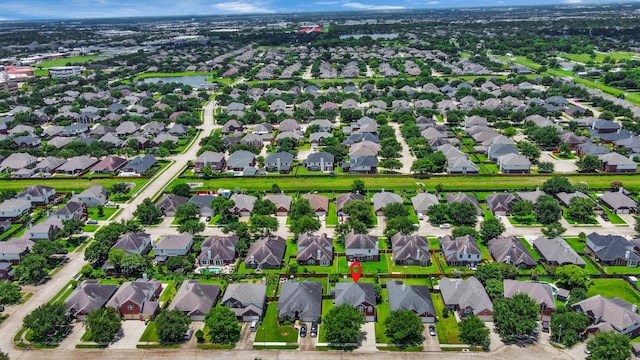 2508 Sun Glen Dr, Pearland, TX 77584 - aerial view of residential area featuring a nearby body of water