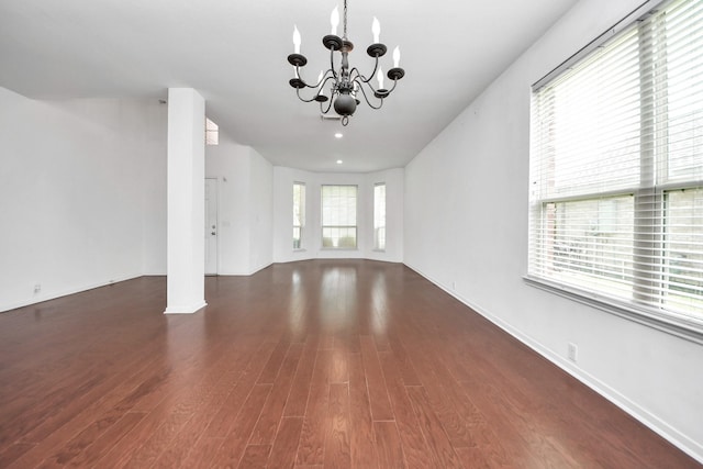 2508 Sun Glen Dr, Pearland, TX 77584 - unfurnished living room with a chandelier and wood finished floors