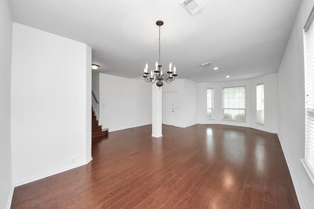 2508 Sun Glen Dr, Pearland, TX 77584 - unfurnished living room featuring a chandelier, wood finished floors, stairway, and recessed lighting