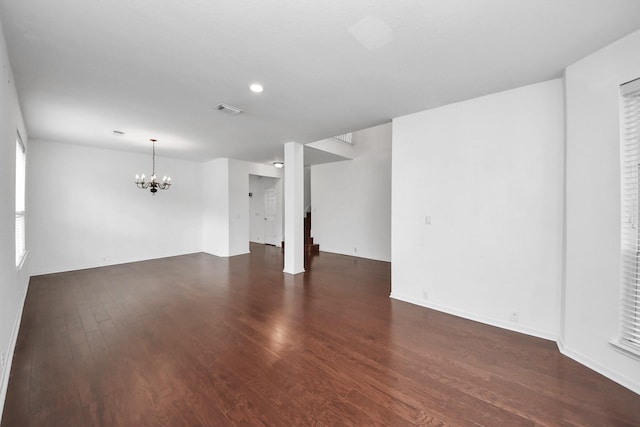 2508 Sun Glen Dr, Pearland, TX 77584 - unfurnished living room with a chandelier, wood finished floors, and recessed lighting