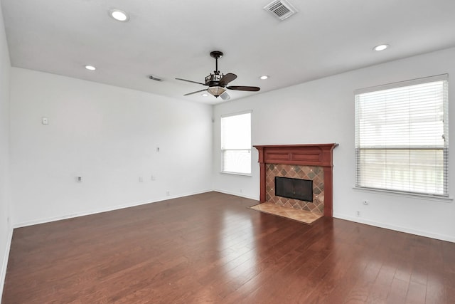 2508 Sun Glen Dr, Pearland, TX 77584 - unfurnished living room with a ceiling fan, a fireplace, dark wood-type flooring, and recessed lighting