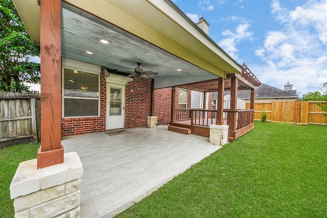 2508 Sun Glen Dr, Pearland, TX 77584 - fenced backyard featuring a ceiling fan and a patio area