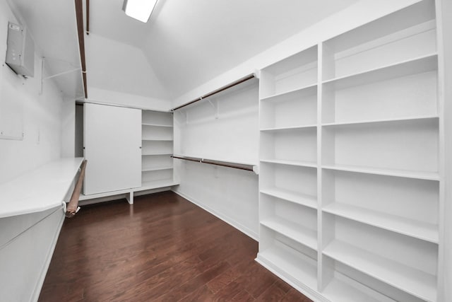 2508 Sun Glen Dr, Pearland, TX 77584 - walk in closet featuring dark wood finished floors and vaulted ceiling