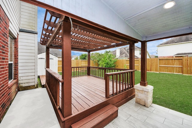 2508 Sun Glen Dr, Pearland, TX 77584 - deck with a pergola, a fenced backyard, and an outbuilding