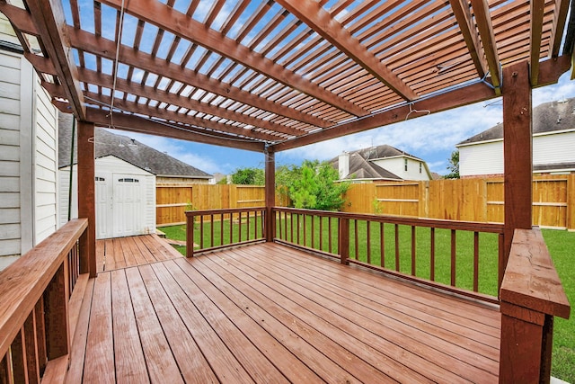 2508 Sun Glen Dr, Pearland, TX 77584 - wooden deck with a fenced backyard, a storage shed, and a pergola