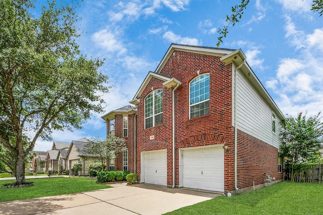 2508 Sun Glen Dr, Pearland, TX 77584 - view of home's exterior with brick siding, concrete driveway, a yard, and an attached garage