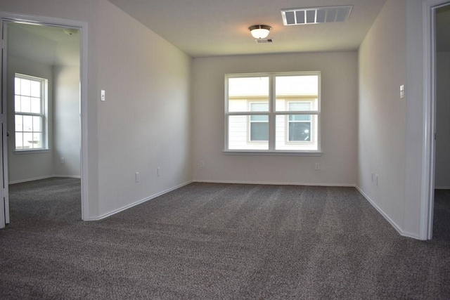 7615 Adobe Canyon Ln, Richmond, TX 77469 - spare room with dark colored carpet