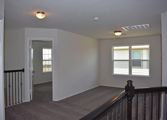 7615 Adobe Canyon Ln, Richmond, TX 77469 - hallway featuring carpet floors and plenty of natural light