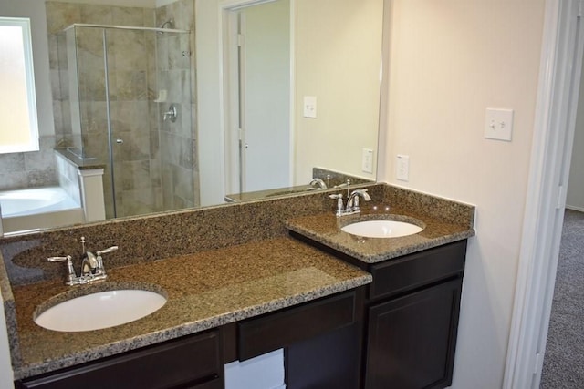 7615 Adobe Canyon Ln, Richmond, TX 77469 - bathroom with a stall shower, vanity, and a garden tub