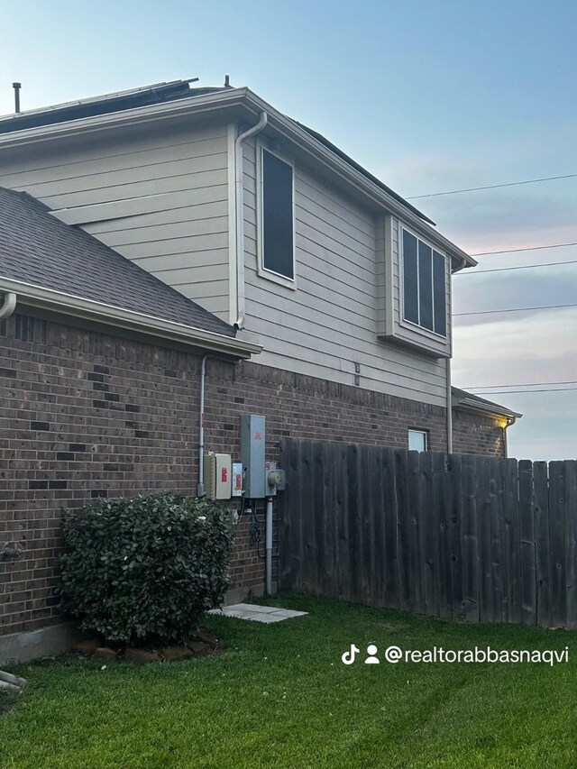 7615 Adobe Canyon Ln, Richmond, TX 77469 - view of side of home featuring brick siding
