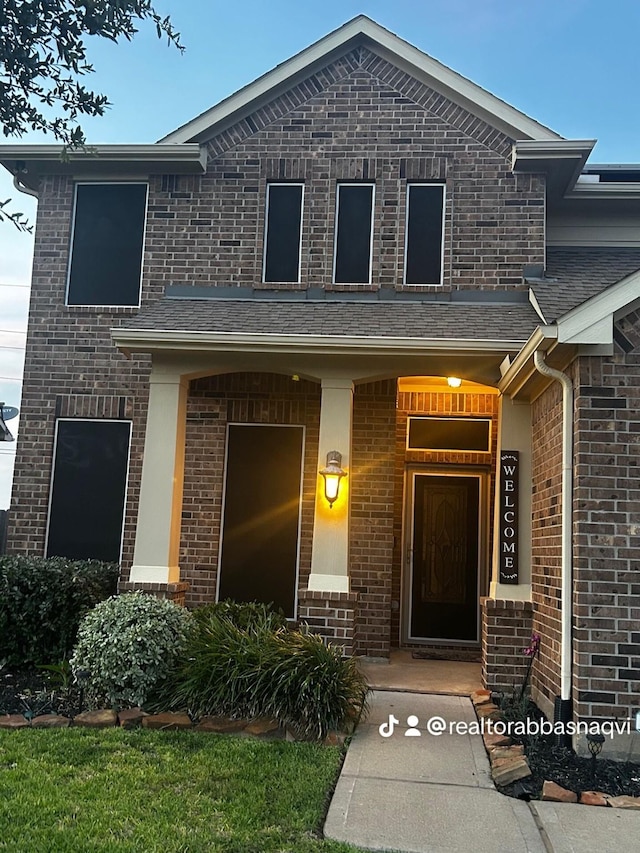 7615 Adobe Canyon Ln, Richmond, TX 77469 - view of exterior entry with brick siding