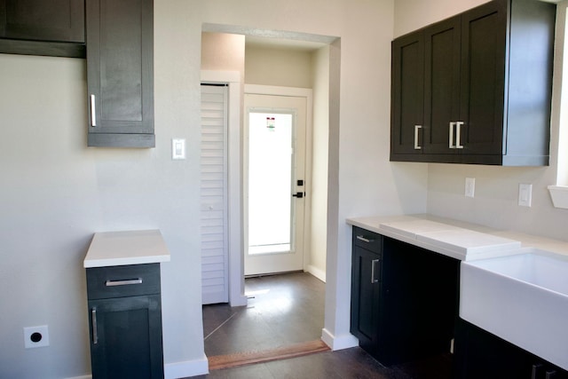 428 Van Molan St, Houston, TX 77022 - kitchen featuring light countertops and dark wood-style flooring