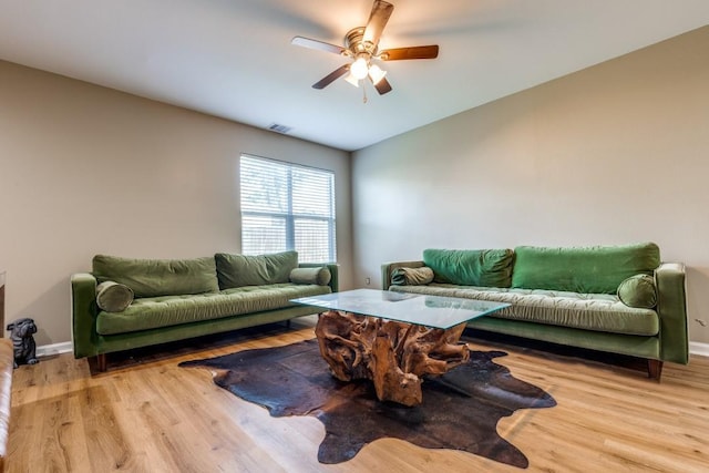 8206 Bassett St, Houston, TX 77051 - living area featuring wood finished floors, lofted ceiling, and ceiling fan