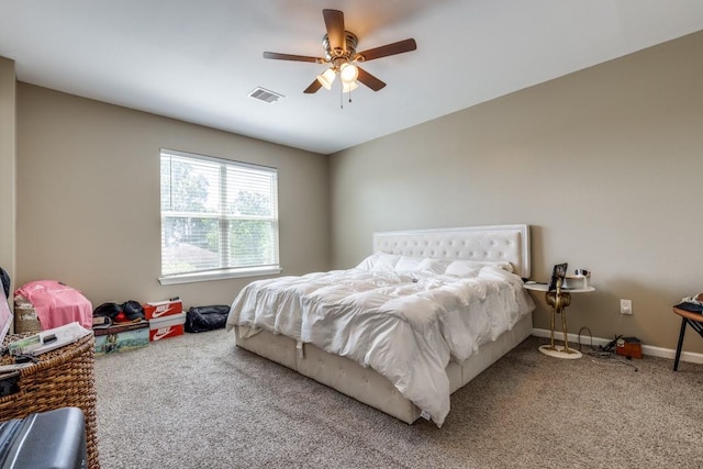 8206 Bassett St, Houston, TX 77051 - carpeted bedroom with a ceiling fan and baseboards