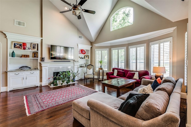 12042 Bolero Point Ln, Houston, TX 77041 - living area featuring a premium fireplace, ceiling fan, plenty of natural light, and high vaulted ceiling