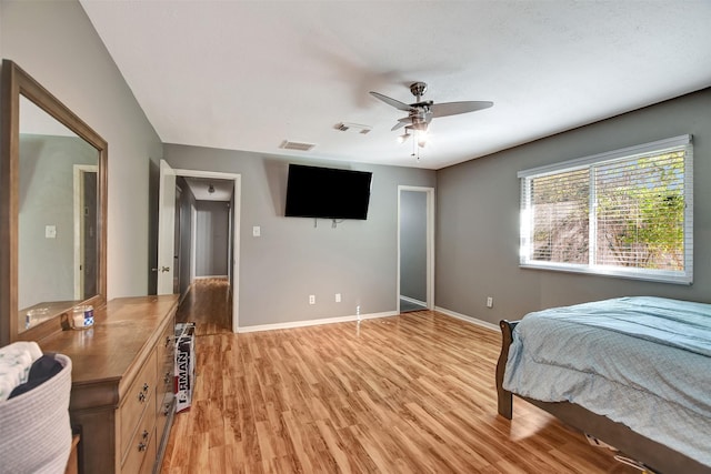 29515 Quinn Rd, Tomball, TX 77375 - bedroom featuring light wood finished floors and ceiling fan