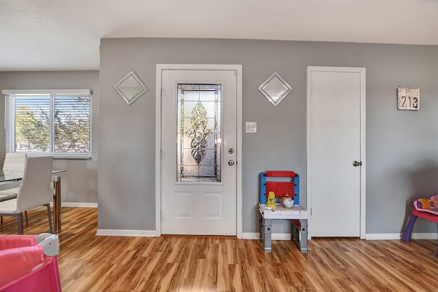 29515 Quinn Rd, Tomball, TX 77375 - foyer entrance featuring light wood-type flooring and plenty of natural light