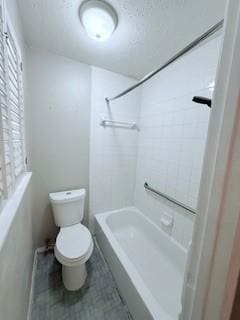 10302 Sageplum Dr, Houston, TX 77089 - bathroom featuring toilet and shower / washtub combination