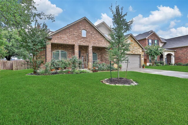 6507 Crystal Forest Trl, Katy, TX 77493 - traditional home with brick siding, a garage, and driveway