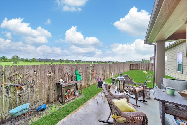 6507 Crystal Forest Trl, Katy, TX 77493 - fenced backyard with a patio area