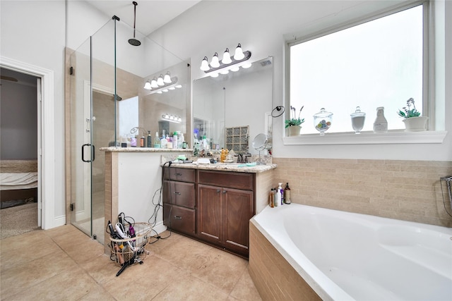 6507 Crystal Forest Trl, Katy, TX 77493 - full bath featuring a shower stall, vanity, a bath, and tile patterned floors