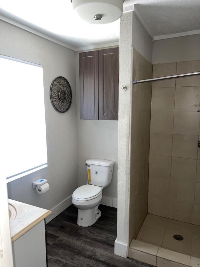 400 Carson Roberson Rd, Livingston, TX 77351 - bathroom with vanity, wood finished floors, and tiled shower