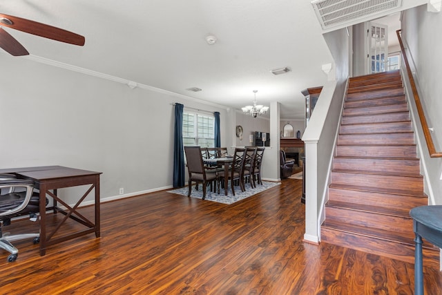 13411 Naples Bridge Rd, Sugar Land, TX 77498 - staircase featuring a ceiling fan, ornamental molding, a chandelier, and wood finished floors