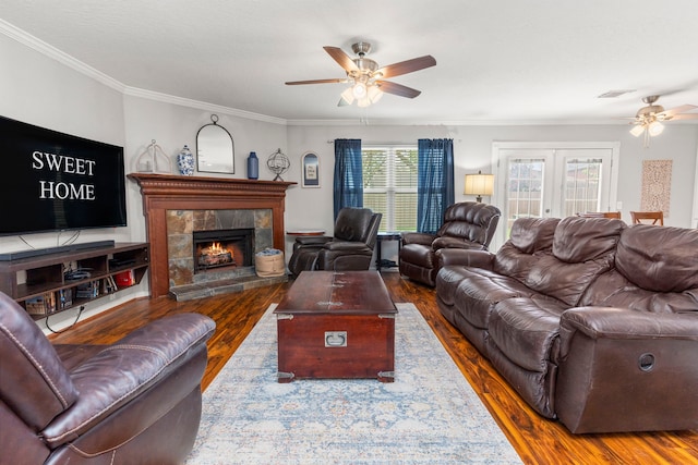 13411 Naples Bridge Rd, Sugar Land, TX 77498 - living area with a ceiling fan, wood finished floors, crown molding, and a fireplace