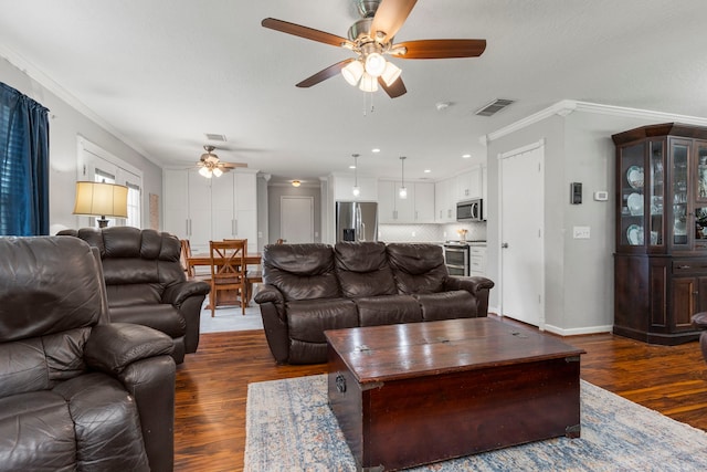 13411 Naples Bridge Rd, Sugar Land, TX 77498 - living area featuring ceiling fan, dark wood finished floors, and ornamental molding