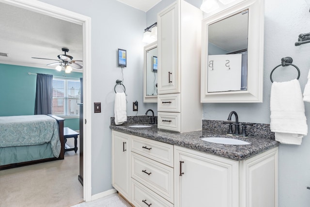 13411 Naples Bridge Rd, Sugar Land, TX 77498 - ensuite bathroom with double vanity and a ceiling fan