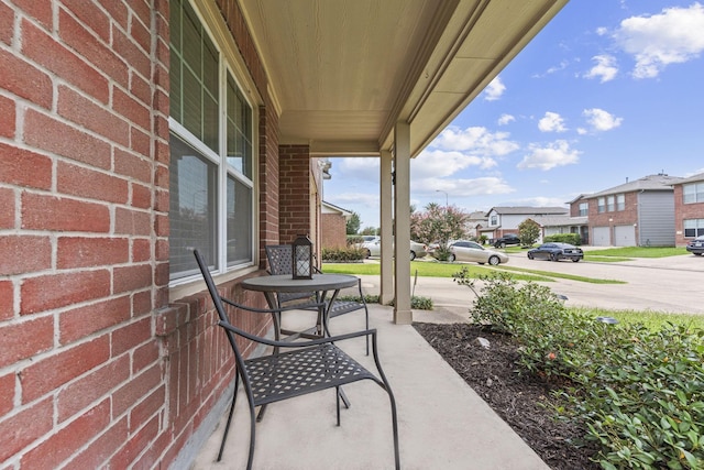13411 Naples Bridge Rd, Sugar Land, TX 77498 - covered porch featuring a residential view