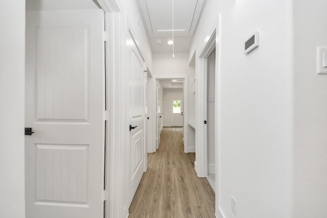 3453 Mainer St, Houston, TX 77021 - hallway with attic access and light wood-style flooring
