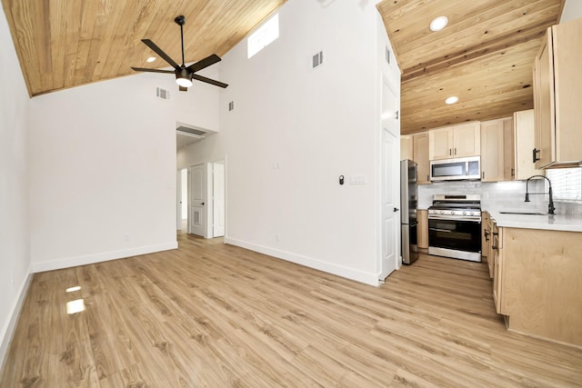 3453 Mainer St, Houston, TX 77021 - unfurnished living room featuring wood ceiling, a ceiling fan, recessed lighting, light wood-type flooring, and high vaulted ceiling