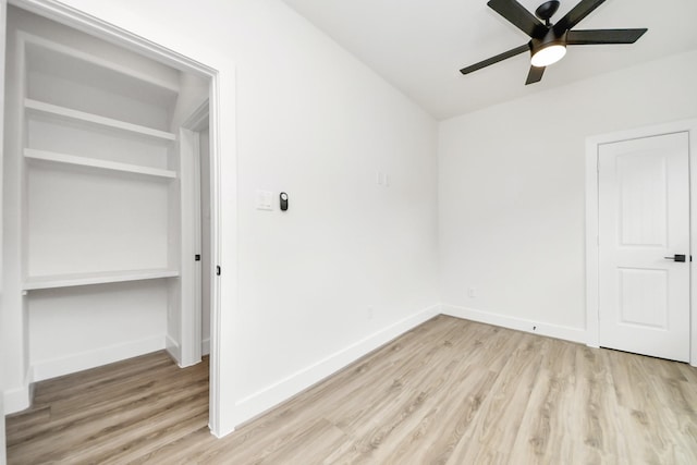 3453 Mainer St, Houston, TX 77021 - unfurnished bedroom featuring wood finished floors and ceiling fan